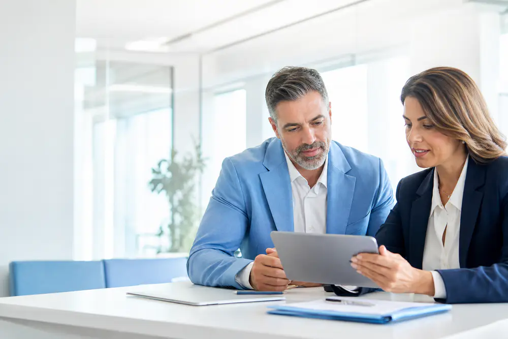 Business owner reviewing commercial insurance options with an advisor