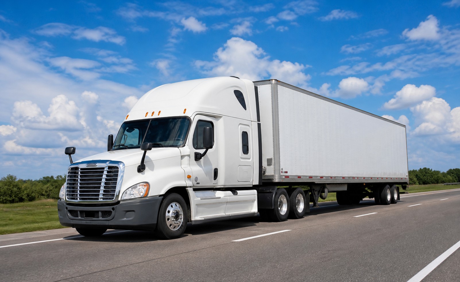 Complete semi-truck and trailer traveling on an open highway